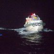 Japan's coast guard has rescued one person from a cargo ship that issued a distress call during a typhoon