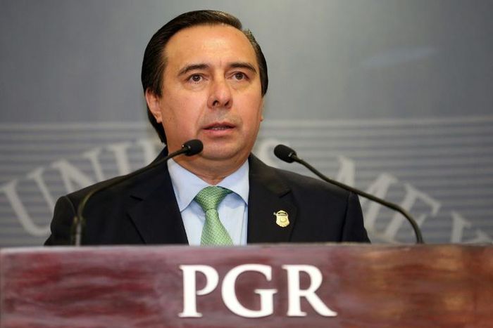 Tomas Zeron (pictured in a September 2015 handout photo), who was head of Mexico's Criminal Investigation Agency, is wanted over allegations of serious irregularities in the probe into one of the country's worst human rights tragedies