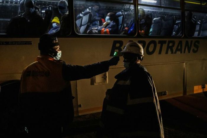 Each shift at the Sibanye-Stillwater platinum mine in South Africa now begins with a temperature check, part of screening measures to stem the spread of the novel coronavirus