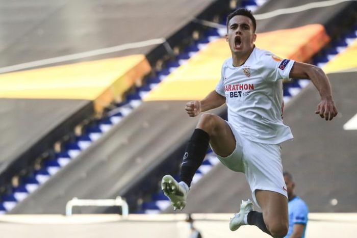 Up for the cup: Sevilla's Sergio Reguilon celebrates his goa against Roma