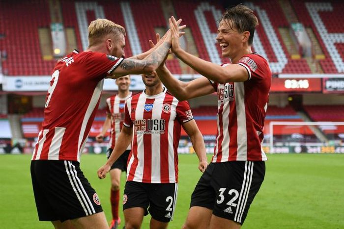 Oliver McBurnie (L) and Sander Berge (R) scored for Sheffield United against Tottenham