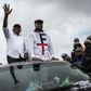 In happier times: Tshisekedi, right, and Vital Kamerhe, wave to supporters at an election campaign rally in Kinshasa in November 2018