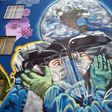 The pandemic is gaining ground in Latin America -- including in Mexico, where this mural was painted