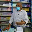 Pharmacy owner Abdulaziz Othman bemoans the acute shortage of medicines at his drugstore in the Sudanese capital Khartoum