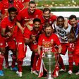Joshua Kimmich (holding trophy) celebrates with his Bayern Munich team-mates after winning Sunday's Champions League final in Lisbon.