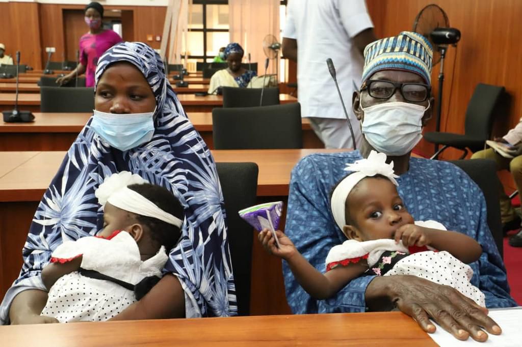Parents of the conjoined twins in Nasarawa after successful separation surgery. [Twitter/@Fmohnigeria]
