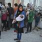 Refugees and migrants wait for medical assistance at a new MSF clinic near Kara Tepe camp