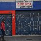 A shuttered storefront in Sao Paulo, Brazil, where small businesses have been ravaged by the coronavirus pandemic