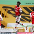 Arsenal's Bukayo Saka celebrates scoring at Wolves