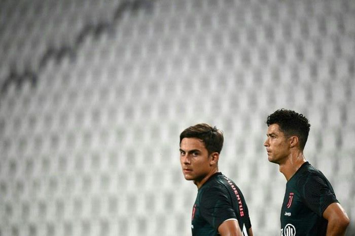 Paulo Dybala (L) and Cristiano Ronaldo (R) have been reported to prosecutors for breaking isolation.