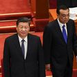 Chinese President Xi Jinping (L) and Premier Li Keqiang (R) arrive for the opening session of the Chinese People's Political Consultative Conference (CPPCC) at the Great Hall of the People in Beijing on May 21, 2020