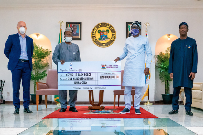 L-R: Managing Director, Nigerian Breweries Plc.,  Jordi Borrut Bel; Chairman, Nigerian Breweries Board of Directors, Chief Kola Jamodu; Lagos State Governor, Babajide Sanwo-Olu and the Deputy Governor, Obafemi Hamzat during the presentation of N100 Mil...