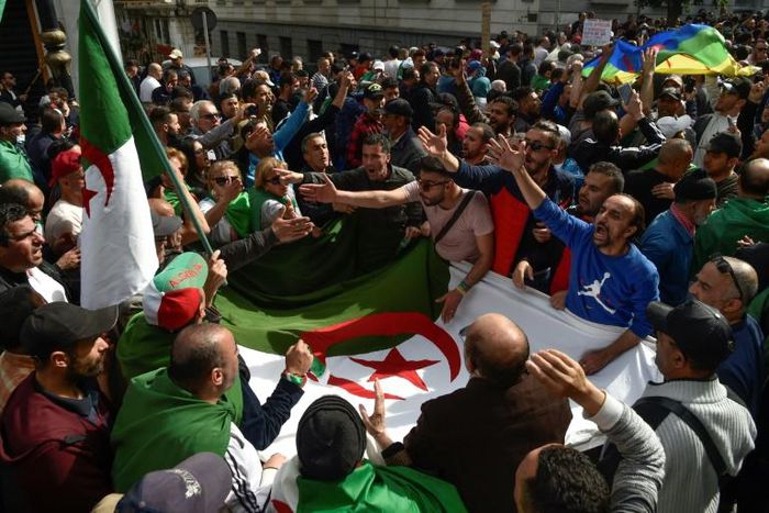 Algerian protesters gathered during a weekly anti-government demonstration in the capital Algiers on March 13 before the coronavirus outbreak halted such rallies