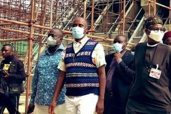 Minister of Transpiration, Rotimi Amaechi and Minister of Infirmation and Culture, Alhaji Lai Mohammed inspecting the rail project in the country. (PMNews)
