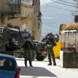 Israeli soldiers hunt for the Palestinian stonethrower believed to be responsible for the death of a comrade during an arrest operation in the village of Yaabad in the occupied West Bank