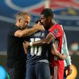 Bayern Munich coach Hans-Dieter Flick (L) and defender David Alaba (R) console Paris Saint-Germain star Neymar after the German club won the Champions League final in August