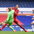 Everton goalkeeper Jordan Pickford (left) has come under fire for his tackle on Liverpool defender Virgil van Dijk
