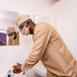 Lagos Governor Babajide Sanwo-olu with a fitting face mask during visit to an isolation center (Lagos govt)