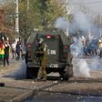 Chilean demonstrators clashed with riot police on May 18 during a protest against President Sebastian Pinera's government