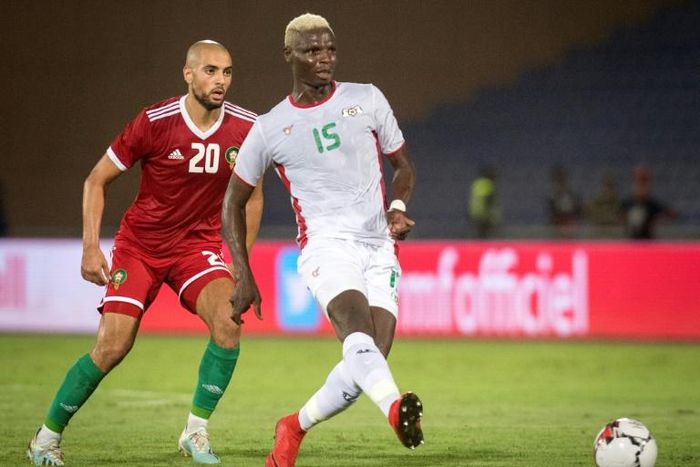 Bance (R) playing for Burkina Faso in an international friendly against Morocco last year