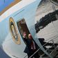 President Donald Trump waves from Air Force One in Miami on July 10, 2020