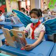 Students are wearing wings to maintain social distancing in Taiyuan in China's northern Shanxi province