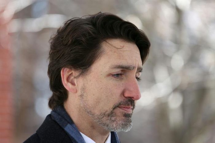 Canadian Prime Minister Justin Trudeau says his government is easing travel restrictions to allow families to reunite with close foreign relatives