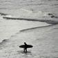 Surfers rushed to Sydney's famous Bondi beach as Australia took its first steps in easing coronavirus restrictions