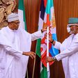 President Muhammadu Buhari presents All Progressives Congress (APC)'s flag to Ondo state Governor, Rotimi Akeredolu. [Twitter/@NigeriaGov]
