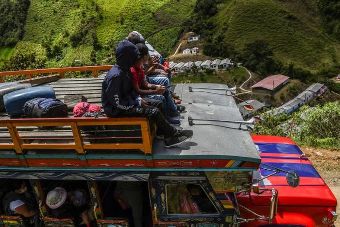 Ex-FARC guerrillas setting off on a journey of thousands of kilometers to flee the violence that has threatened their commune