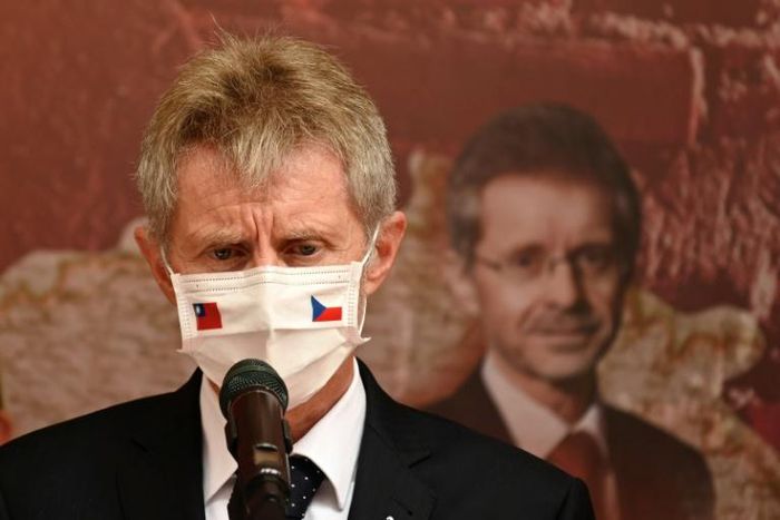 Czech Senate speaker Milos Vystrcil speaks to the press in Taipei whil wearing a face mask bearing the flags of the Czech Republic and Taiwan