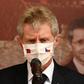 Czech Senate speaker Milos Vystrcil speaks to the press in Taipei whil wearing a face mask bearing the flags of the Czech Republic and Taiwan
