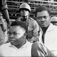 Downfall: Congolese independence hero Patrice Lumumba, right, and Joseph Okito, the vice president of the senate, pictured on their arrest in December 1960 in Leopoldville, now Kinshasa