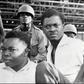 Downfall: Congolese independence hero Patrice Lumumba, right, and Joseph Okito, the vice president of the senate, pictured on their arrest in December 1960 in Leopoldville, now Kinshasa