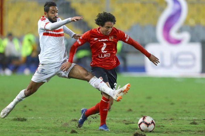 Mohamed Hany (R) scored the opening goal as Egyptian league leaders Al Ahly returned to action after a 150-day coronavirus-induced suspension with a 2-0 victory over ENPPI