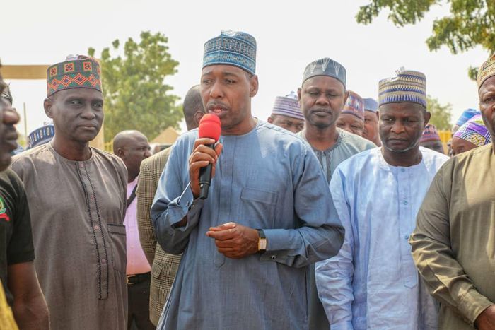 Borno state Governor, Babagana Umara Zulum said ‘I try to resist shading tears while distributing relief materials to IDPs’. [Twitter/@ProfZulum]