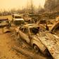 Vehicles torched in central California's Creek Fire smolder in an unincorporated area of Fresno County