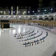 A handful of worshippers pray at the Islam's holiest shrine, the Grand Mosque complex in Saudi Arabia's holy city of Mecca, usually teeming with pilgrims as the annual hajj pilgrimage approaches