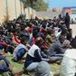 Tens of thousands of refugees and asylum-seekers -- similar to these African migrants who fled Libyan battle zones, pictured April 2019 at at a detention center in Zawiya -- have been stranded in chaos-wracked Libya