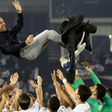 Former Barcelona great Xavi Hernandez, who has signed on as coach of Qatari club Al-Sadd for one more year, is thrown in the air after leading the side to victory in the 2020 Qatar Cup