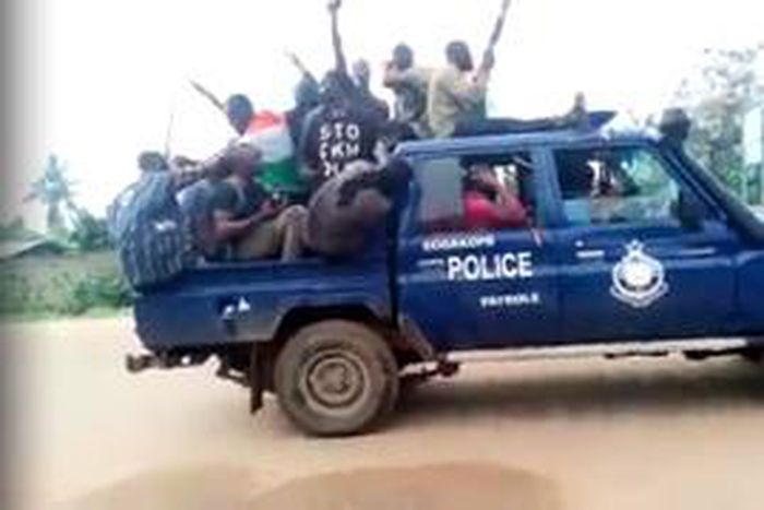Western Togoland members with police car