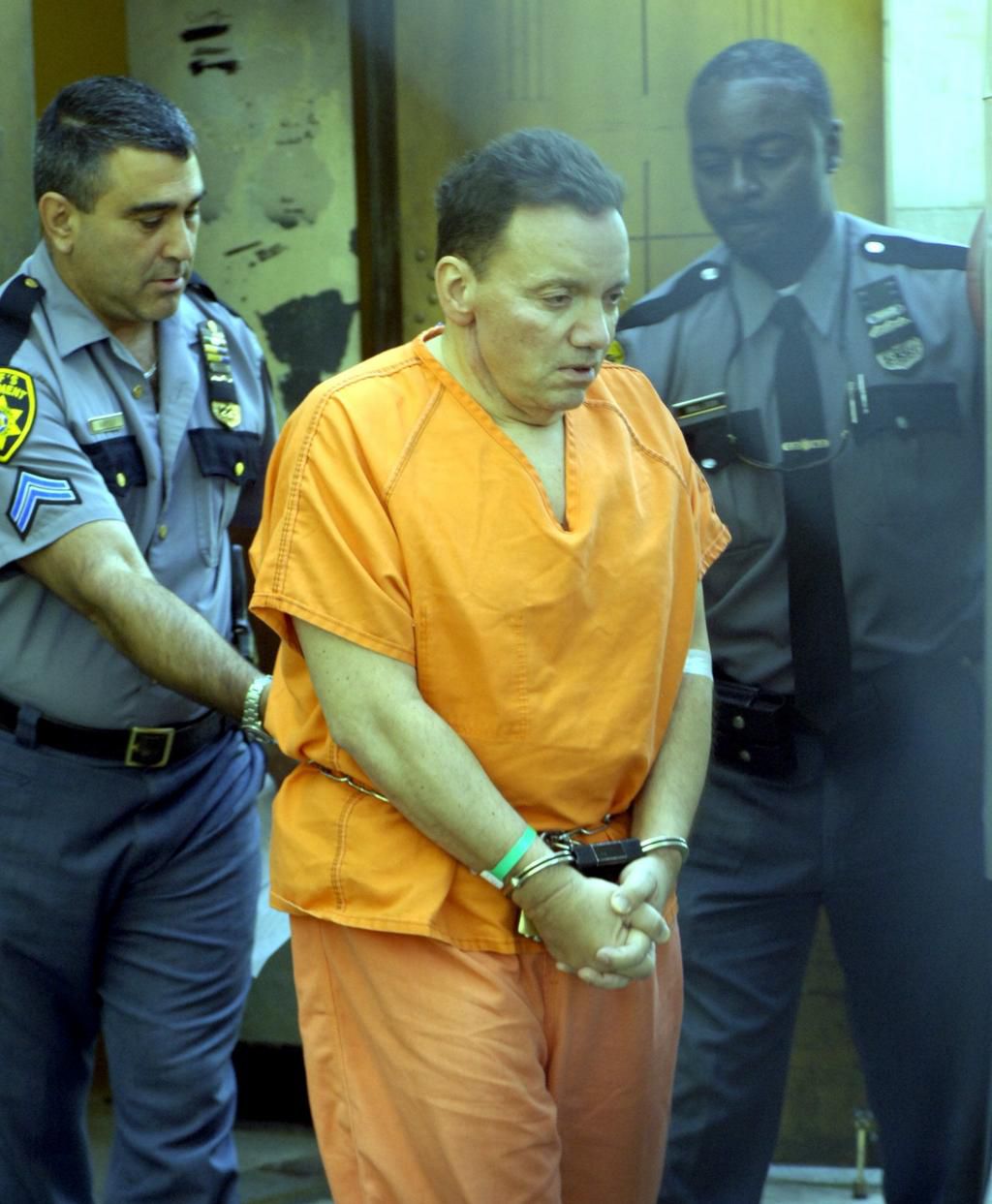 Former Roslyn schools superintendent Frank Tassone leaves Nassau County Court after being sentenced in the Roslyn embezzlement scandal on October 10, 2006.