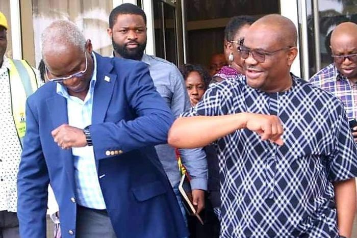 Governor Nyesom Wike and Babatunde Raji Fashola. [Twitter@NyesomWike]