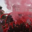 Liverpool fans gathered outside Anfield to welcome their side before kick-off