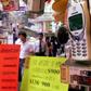 People walk past a mobile phone shop displaying lucky telephone numbers for sale in Hong Kong. Many Asian cultures consider certain numbers -- such as eight -- as good fortune