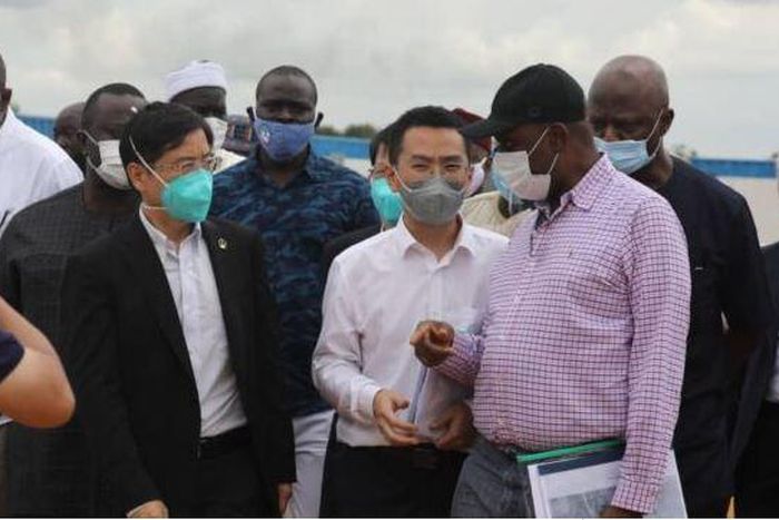 The Minister of Transportation, Rotimi Ameachi at the site of the Transportation University in Daura with the Chinese Contractors. (TheCable)