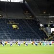 Borussia Dortmund and Hertha berlin players take a knee in solidarity with protests raging across the United States over the death of George Floyd