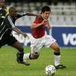 New Chippa United coach Lehlohonolo Seema (L) playing for Orlando Pirates against Manchester United in a tour match