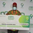 Chief Tony Nnaji, 1 million Naira winner in the ongoing 9mobile Mega Millions Promo prize presentation in Port Harcourt