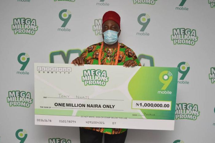 Chief Tony Nnaji, 1 million Naira winner in the ongoing 9mobile Mega Millions Promo prize presentation in Port Harcourt